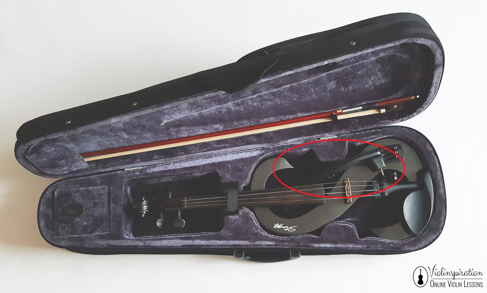 Where to put a shoulder rest in a case - shoulder rest fits next to the electric violin