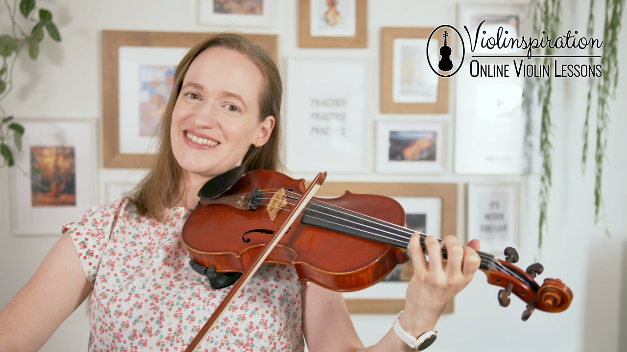 Julia with a violin in a playing position