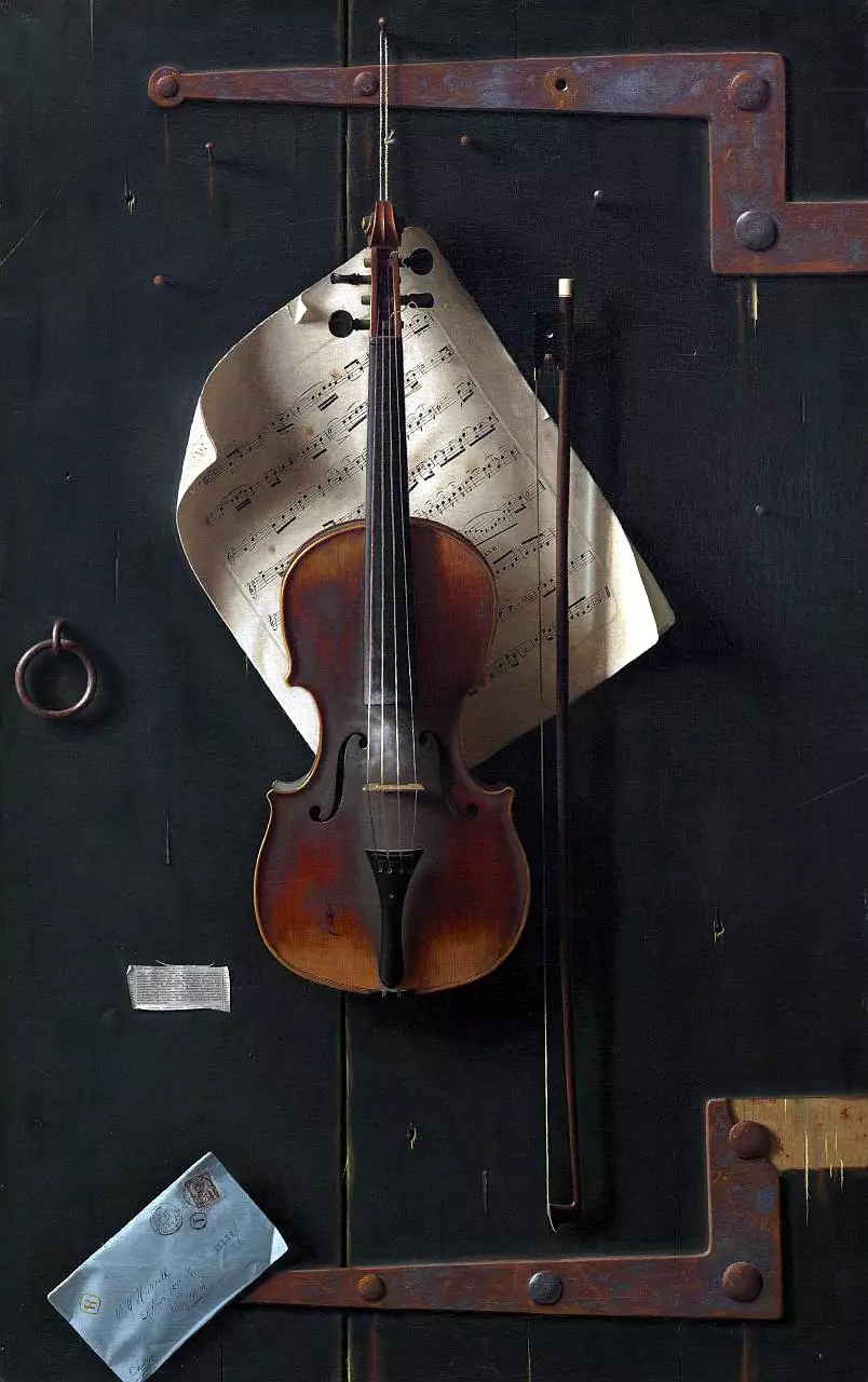 Violin hanging on a wall from a rope loop secured around the scroll and pegs