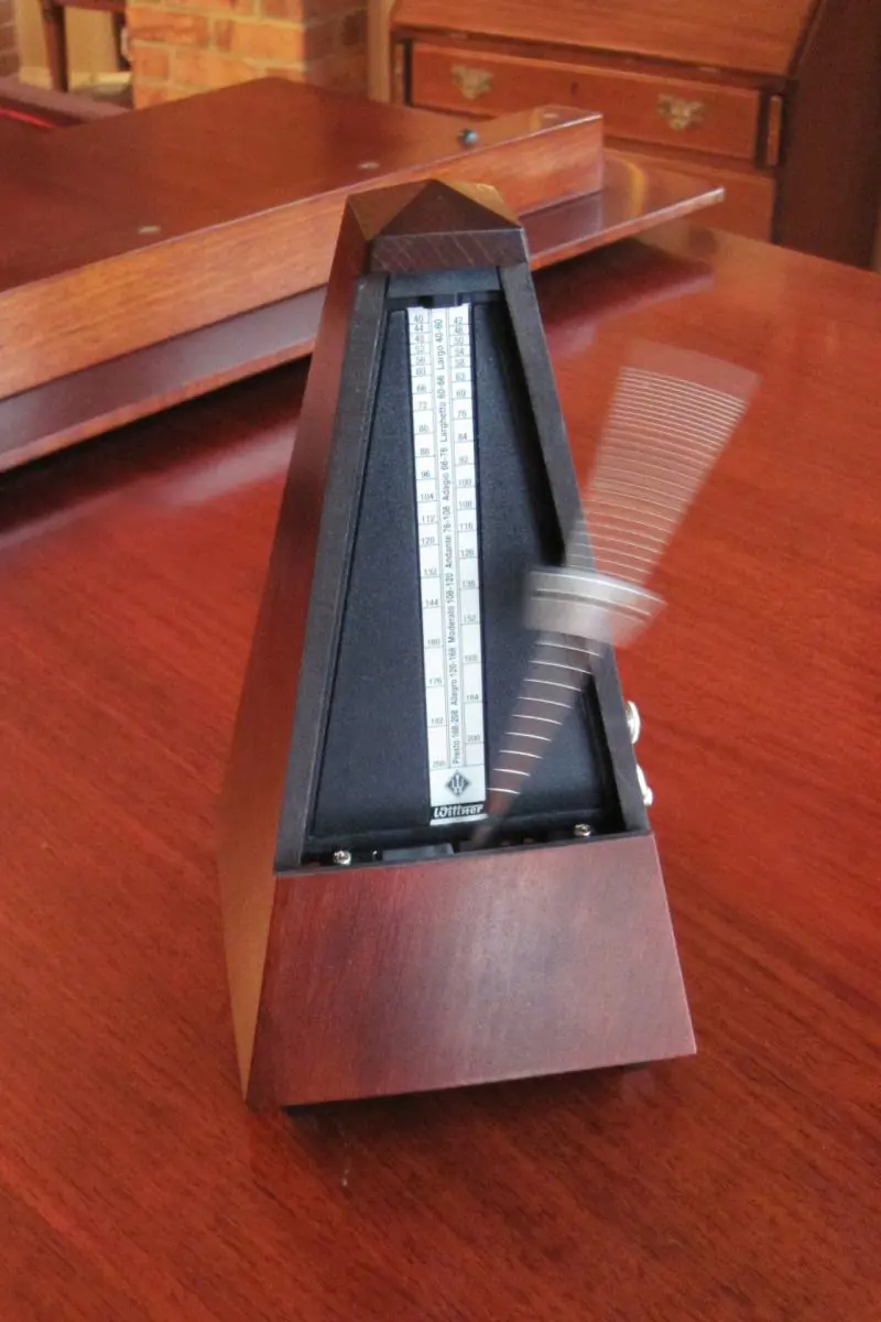 Mechanical metronome set to a fast tempo for violin practice