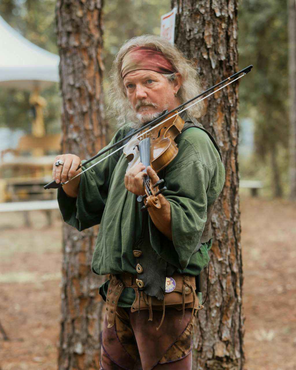 irish violin music - man in green shirt playing violin