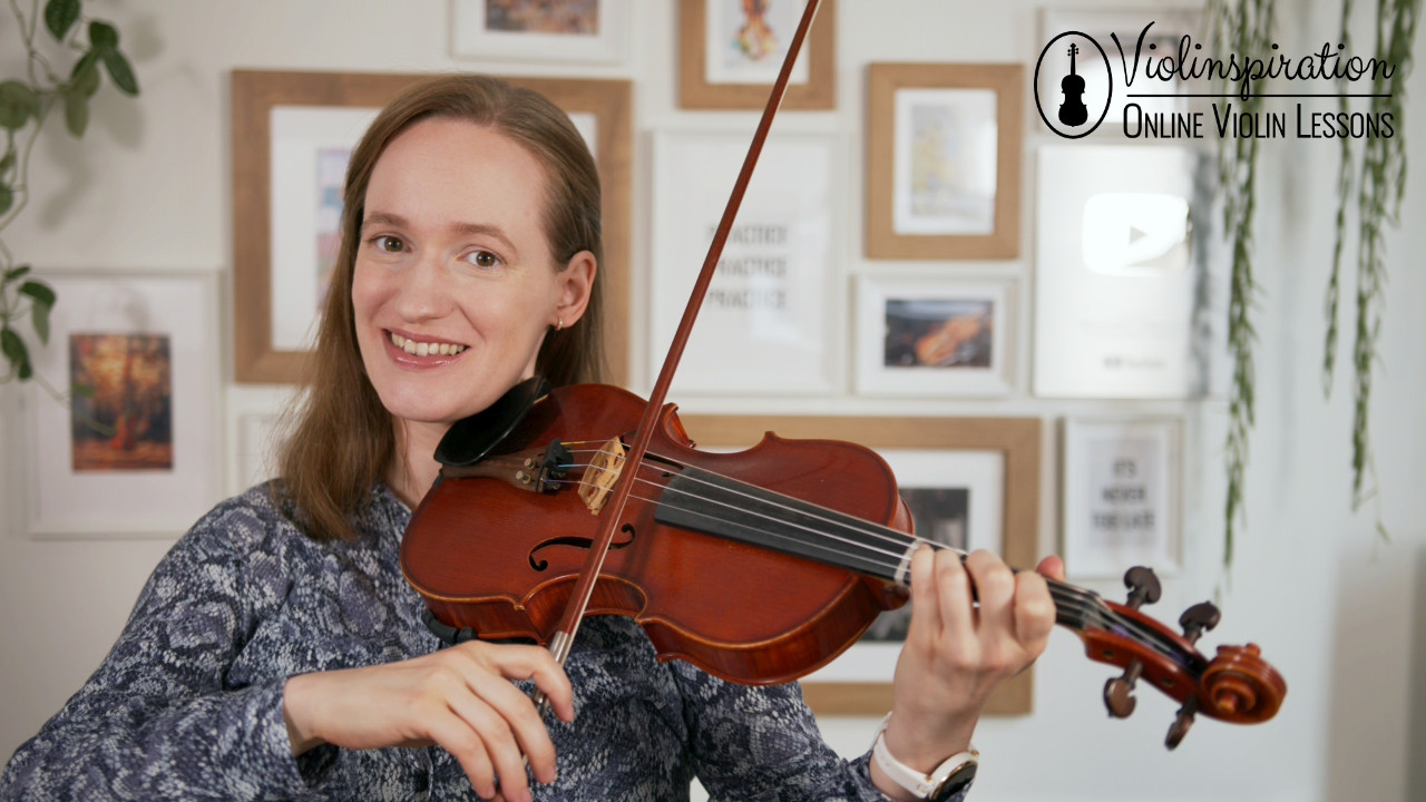 minor keys - Julia smiling with a violin in playing position