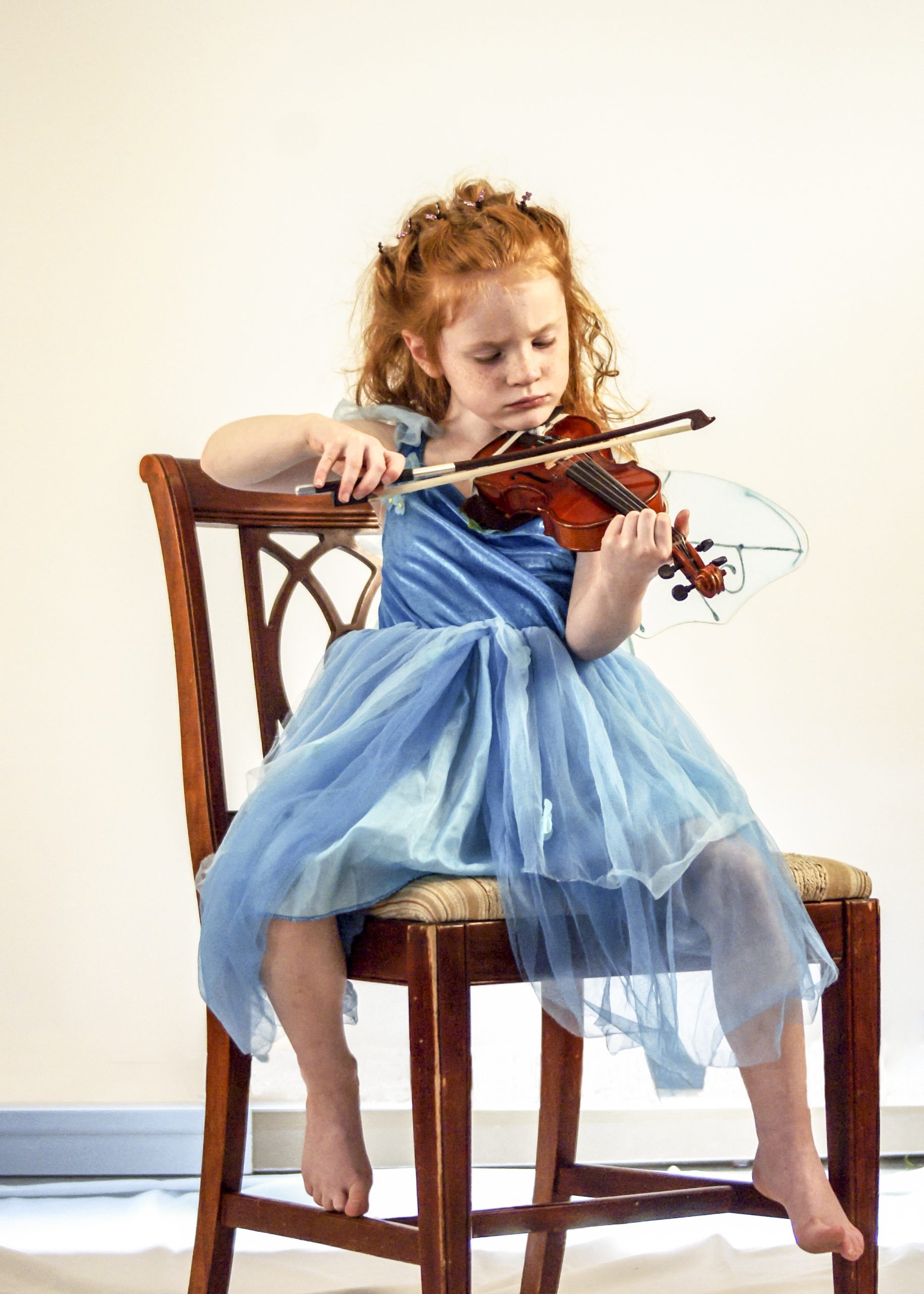 violin lessons cost - group lessons at school