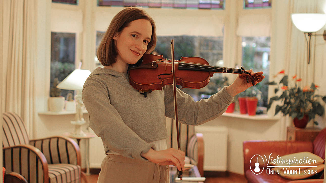 violin solos - Julia tunes her violin before playing